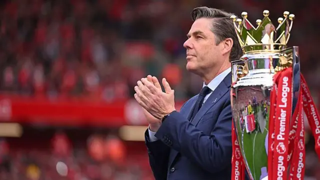 Richard Masters with 2024-25 Premier League trophy