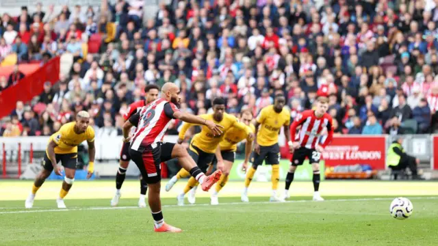 Bryan Mbeumo of Brentford scores his team's second goal from the penalty spot