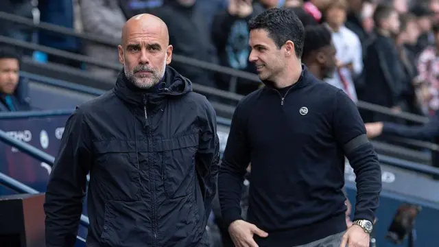 Pep Guardiola and Mikel Arteta