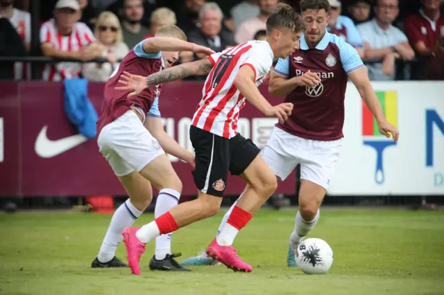 Jack Clarke dribbles past two South Shields players during their 2023 pre-season friendly