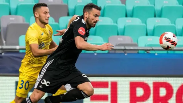 Enes Alic (left) playing for NK Domzale