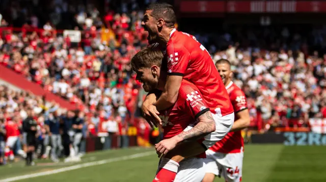 Charlie Kelman is mobbed after scoring Charlton's opening goal against Hull City at The Valley