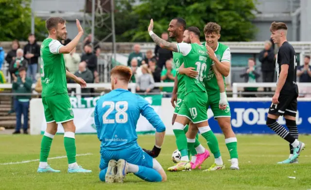 Hibs celebrate at Borough Briggs