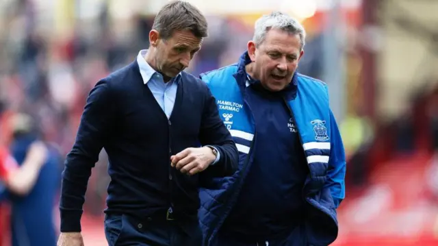 Kilmarnock Manager Neil McCann and Billy Dodds at Full Time during a William Hill Premiership match between Aberdeen and Kilmarnock at Pittodrie Stadium, on April 25, 2026, in Aberdeen, Scotland