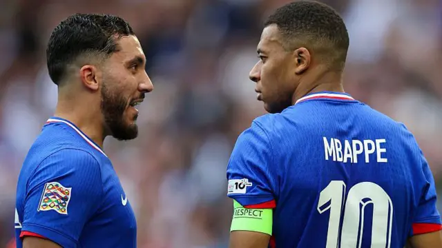 Rayan Cherki and Kylian Mbappe