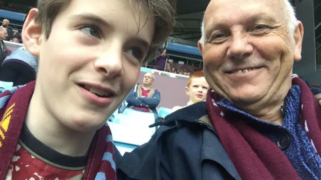 A picture of a teenager and his grandad