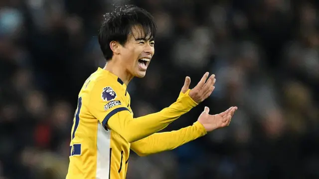 Kaoru Mitoma of Brighton & Hove Albion celebrates after scoring against Manchester City 