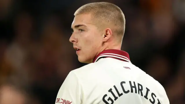 Alfie Gilchrist looks on in a Sheffield United shirt