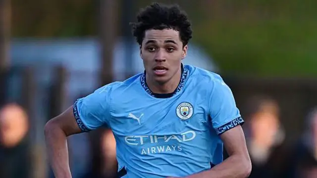 Max Alleyne in action for Man City