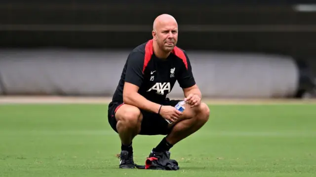 Arne Slot watches a Liverpool training session