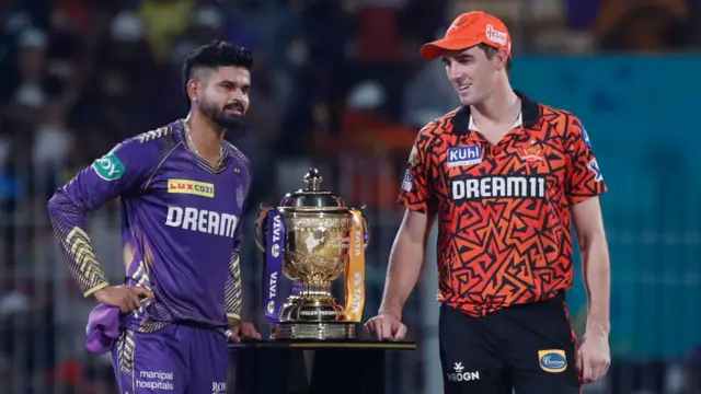 Pat Cummins (c) of Sunrisers Hyderabad and Shreyas Iyer (c) of Kolkata Knight Rider poss with Indian Premier League (IPL) trophy at the toss during the 2024 IPL Final match between the Kolkata Knight Riders and Sunrisers Hyderabad