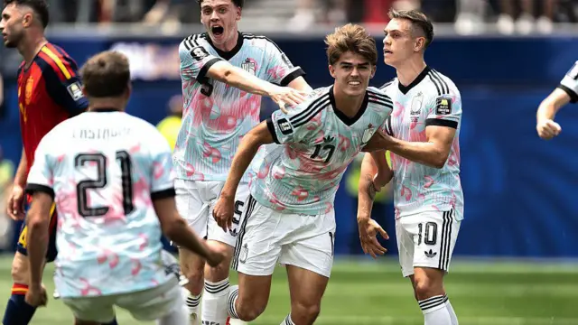 Belgium's Charles De Ketelaere celebrates scoring