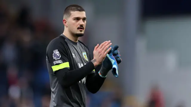 Arijanet Muric applauds the fans after the match