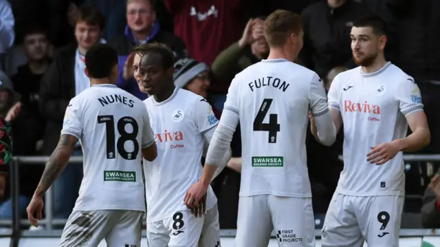 Swansea players celebrate against Sheffield Wednesday 