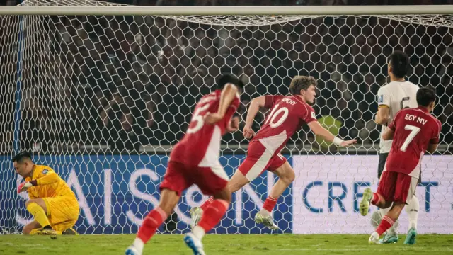 Ole Romeny celebrates scoring a penalty for Indonesia in their 1-0 win over China in an Asian World Cup qualifier