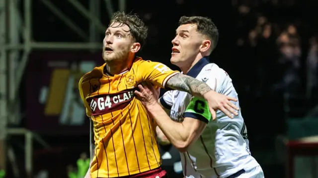 Motherwell's Callum Slattery and Dundee's Paul Digby