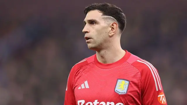 Emiliano Martinez of Aston Villa looks on