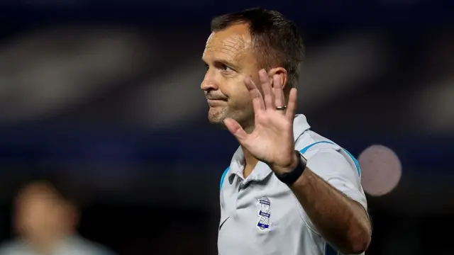 Birmingham City boss Chris Davies holds his hand up to the Blues fans after Tuesday night's miserable 6-1 home defeat