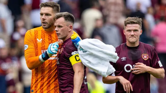 Rangers' Jack Butland shakes hands with Hearts' Lawrence Shankland