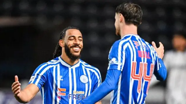 Dominic Thompson celebrates with Kilmarnock