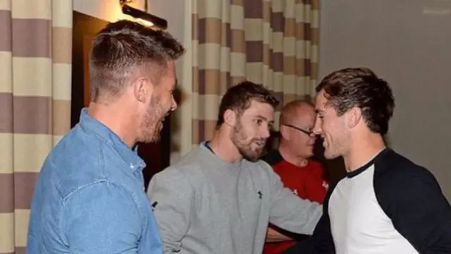 Leigh Halfpenny and Rhys Webb present shirts to Welsh team