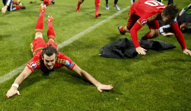 Gareth Bale slides in celebration