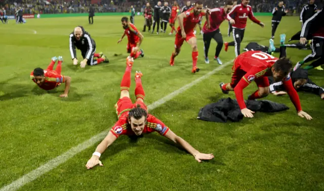 Gareth Bale slides in celebration