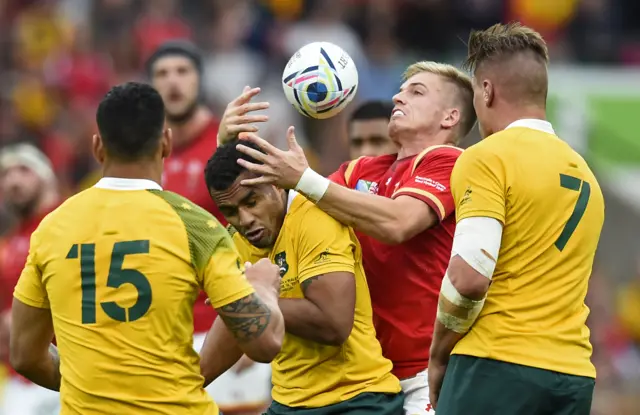 Gareth Ainscombe attempts to win the ball