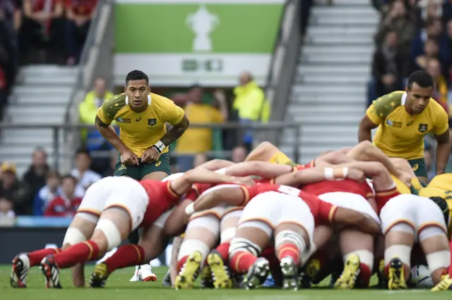 An early scrum in the match between Wales and Australia