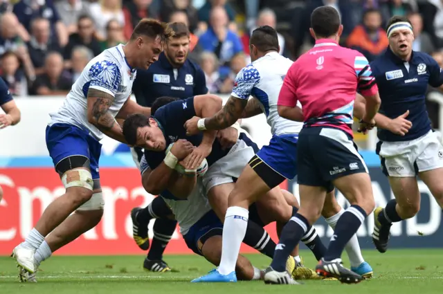 John Hardie is tackled