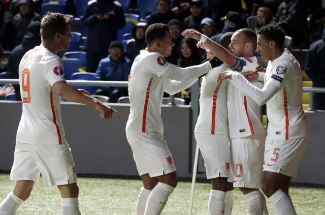 Sneijder celebrates scoring for the Netherlands