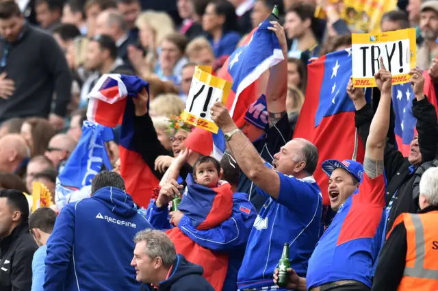 Samoa fans celebrate the try