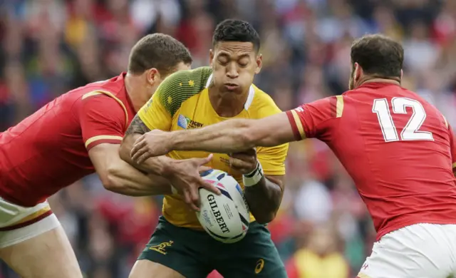 Israel Folau is tackled