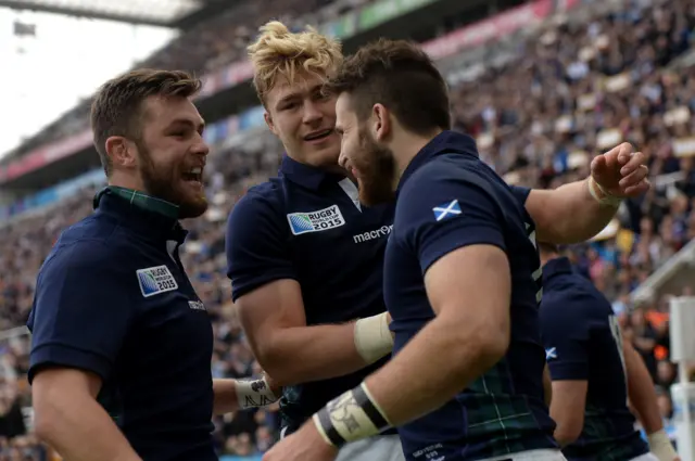 Tommy Seymour celebrates with his teammates