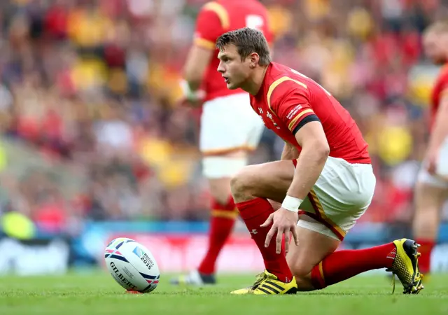 Dan Biggar of Wales kicks the penalty