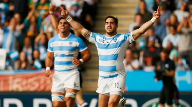 Horacio Agulla celebrates scoring his try