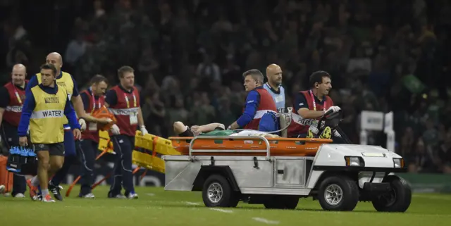 Peter O'Mahony is stretchered off the field