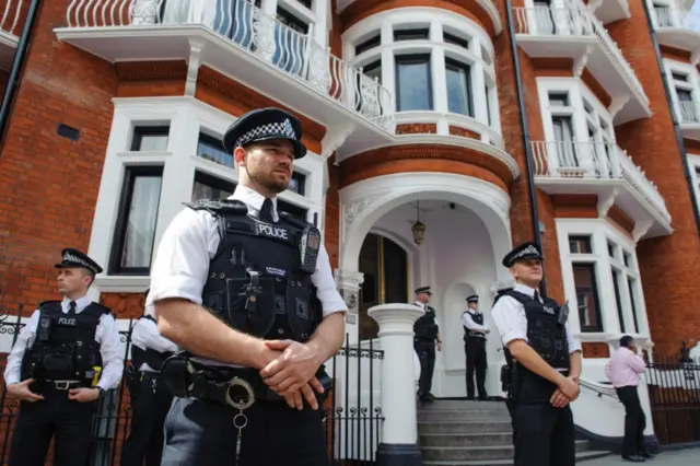 Police outside the Ecuadorian embassy in Knightsbridge, London