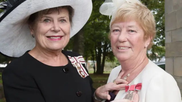 Olga Bainbridge and the Lord Lieutenant of Durham, Sue Snowden, and the British Empire Medal