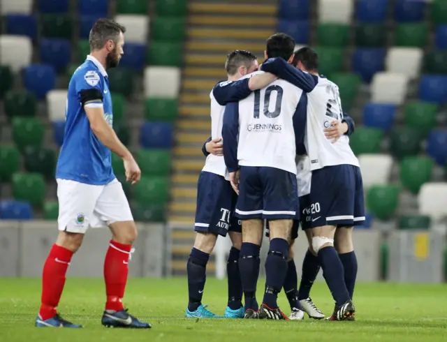 Ballinamallard players celebrate knocking Linfield out of the League Cup