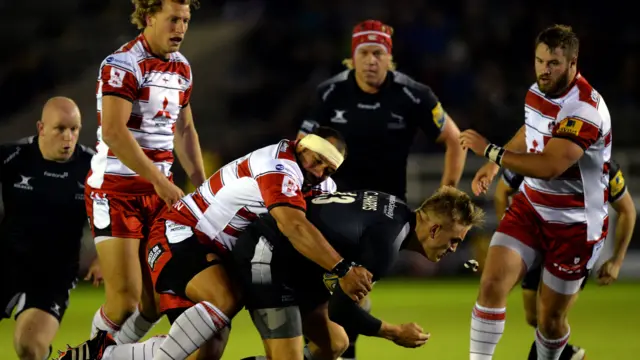 John Afoa of Gloucester makes a tackle