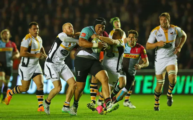 Mat Luamanu of Harlequins goes on the attack