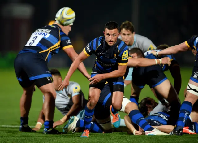 Jonny Arr of Worcester passes the ball