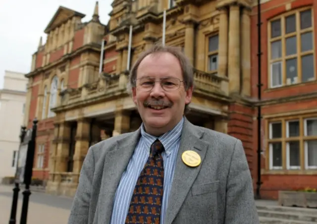 Liberal Democrats leader Alan Boad .
