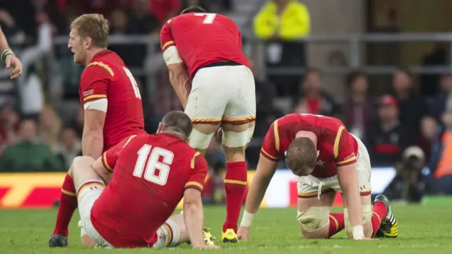 The Wales players at full-time