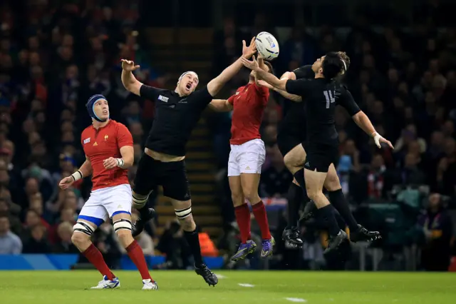 New Zealand players compete for the ball