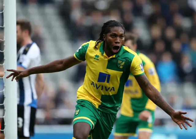 Dieumerci Mbokani celebrates