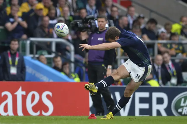 Greg Laidlaw kicks a penalty