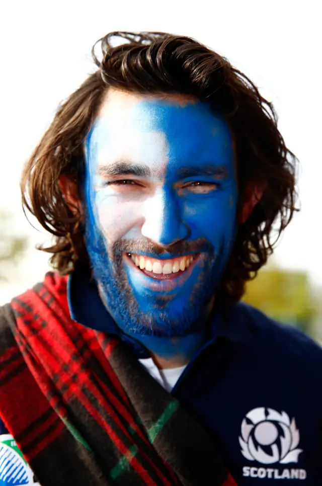 A Scottish fan in face paint