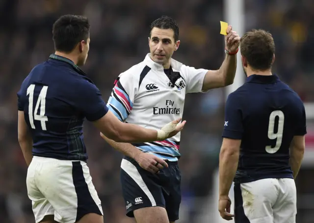 Sean Maitland is shown a yellow card